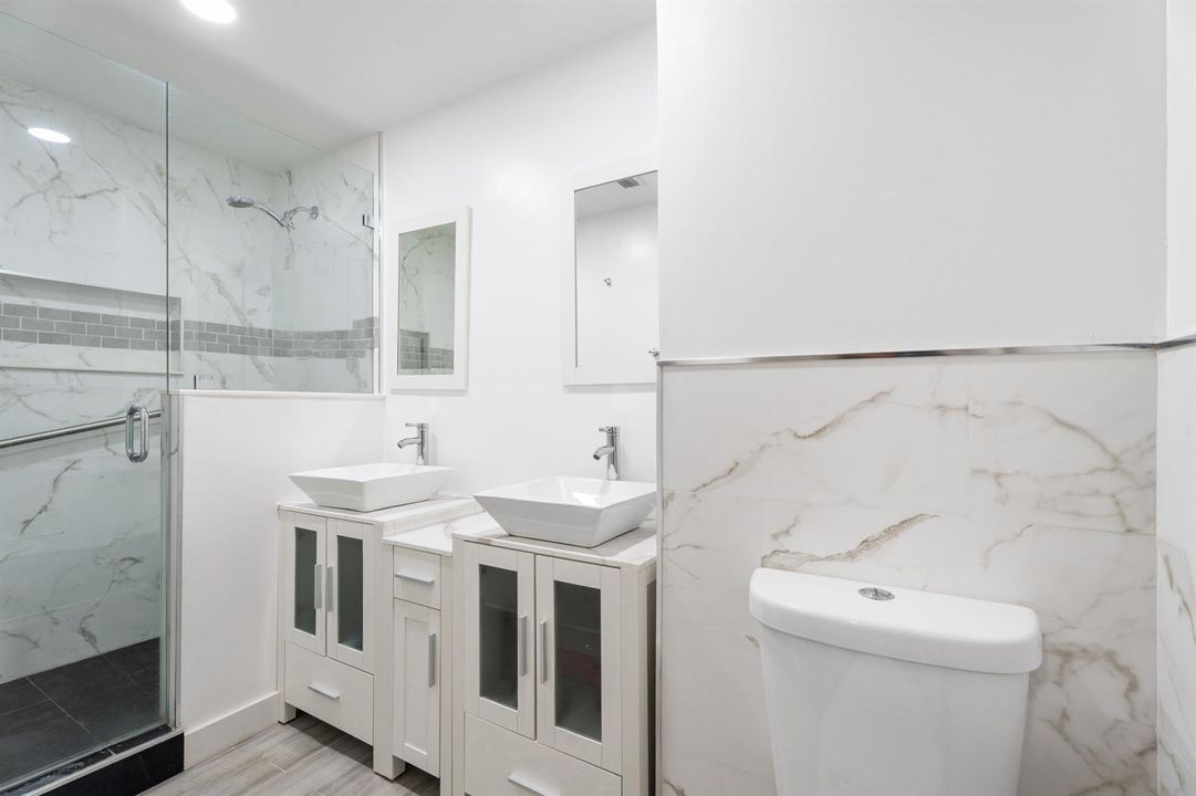 Ensuite bathroom with dual vanities