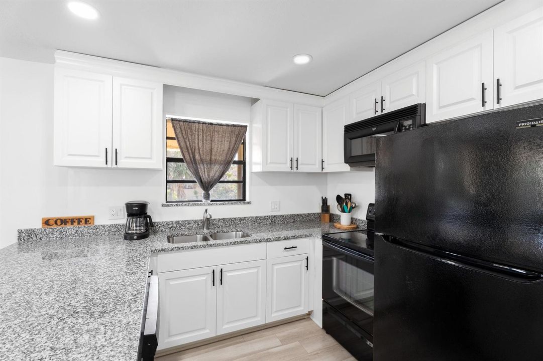 Kitchen with granite countertops