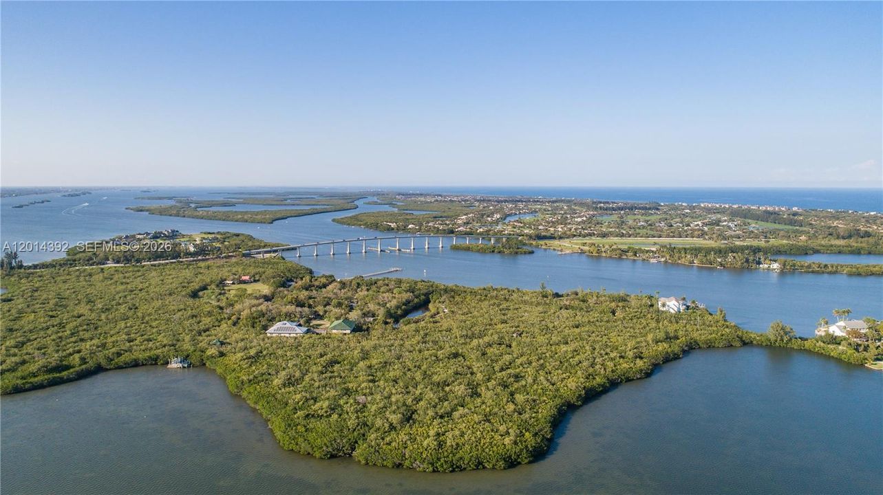Vero Beach as seen from drone: Indian River in foreground, Atlantic Ocean to the East.