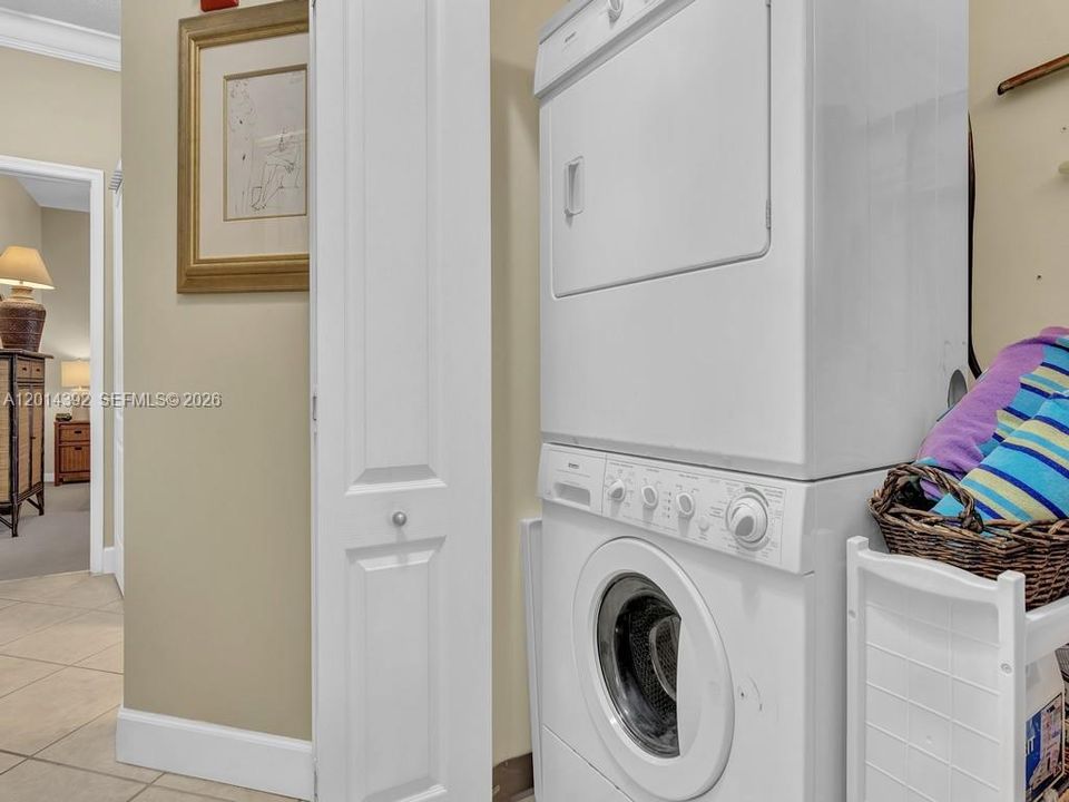 Full-sized Inside Washer/Dryer inside unit.
