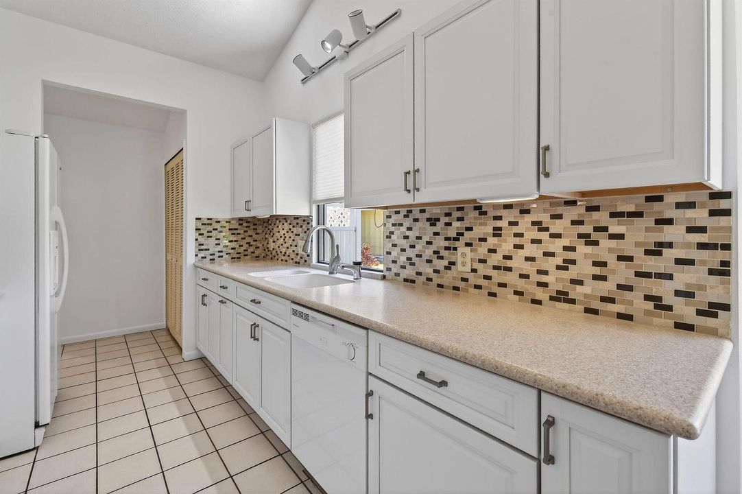 Corian Countertops, White Cabinets
