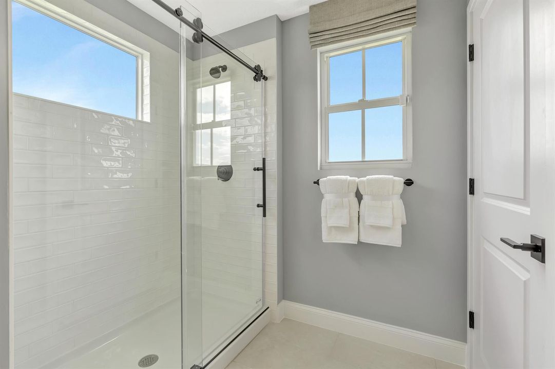 Large walk in shower with barn door