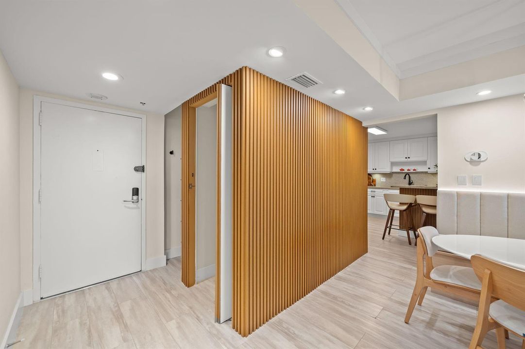 door seamlessly wood-slatted paneling