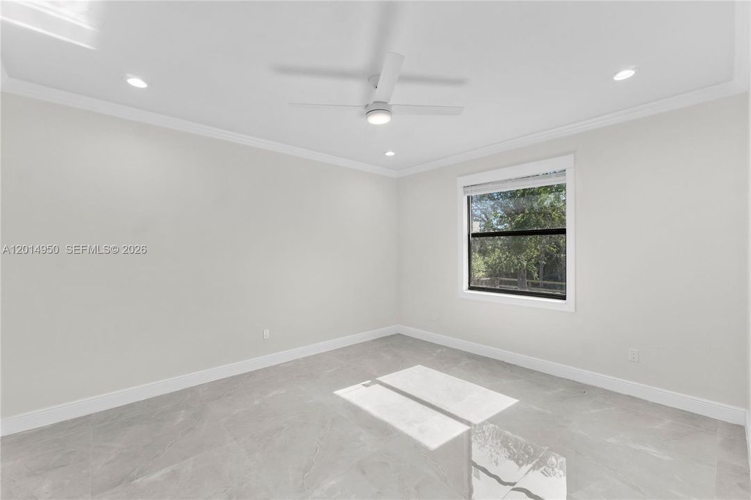 Primary bedroom with natural light