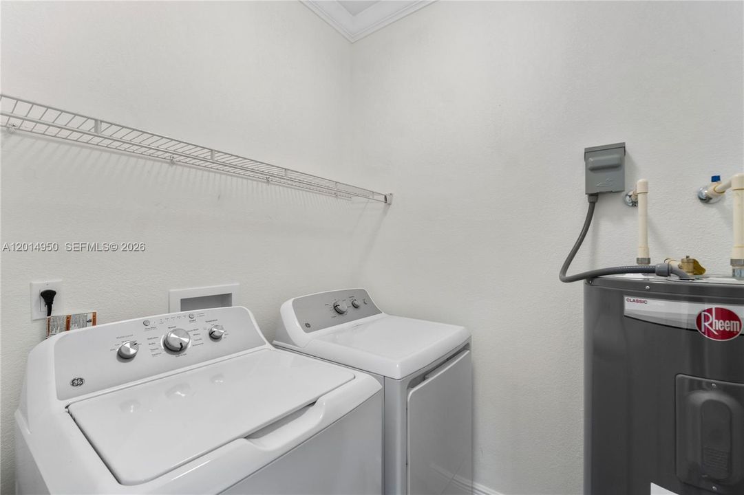 Laundry room with washer and dryer
