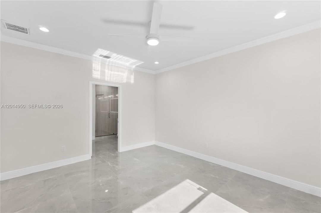 Primary bedroom with natural light