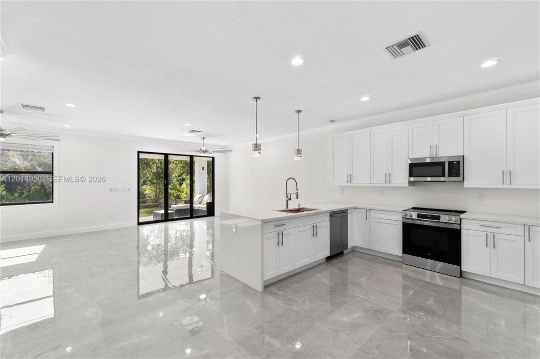 Open concept kitchen and dining area