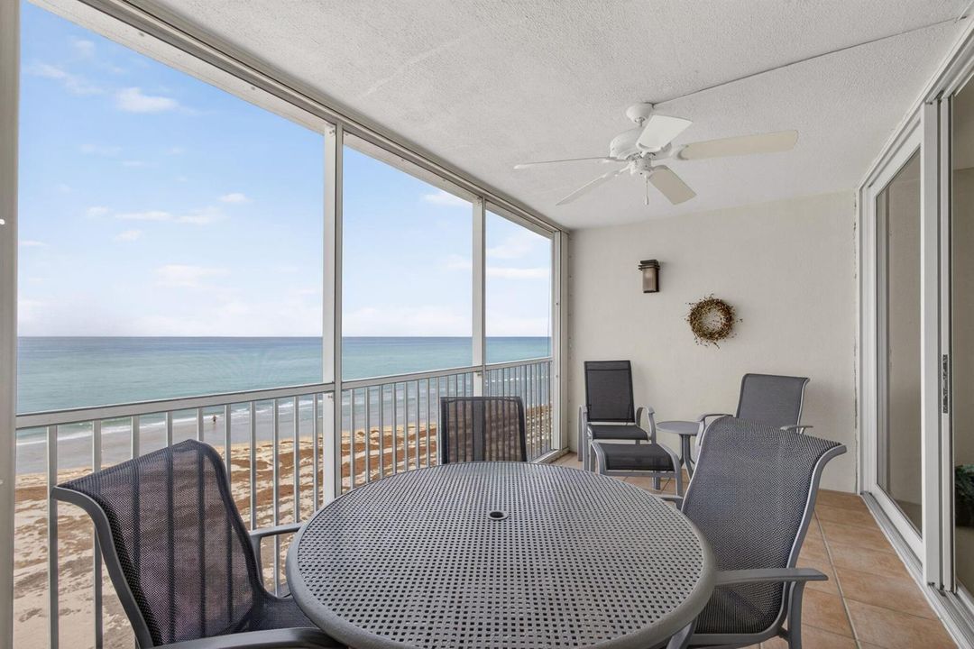 View from balcony of beach and ocean