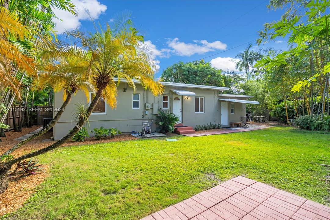 Landscaped and fenced back yard.