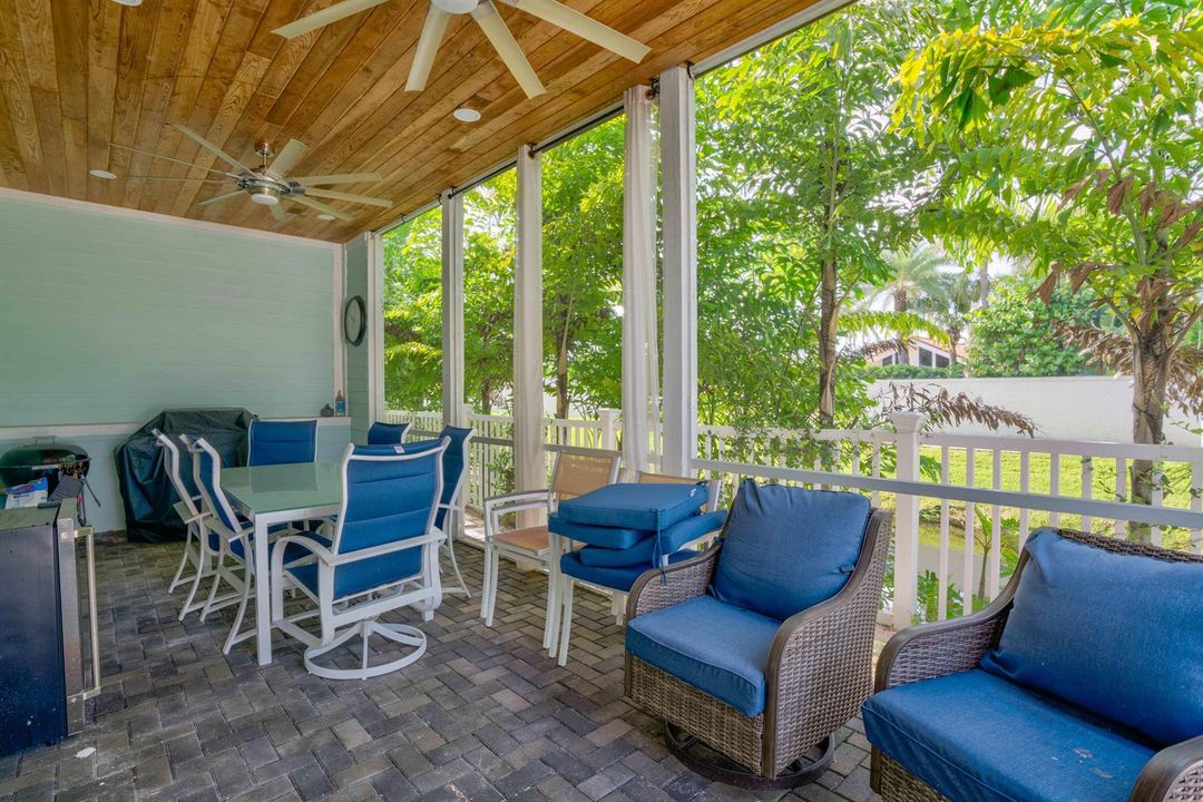 screened patio next to pool