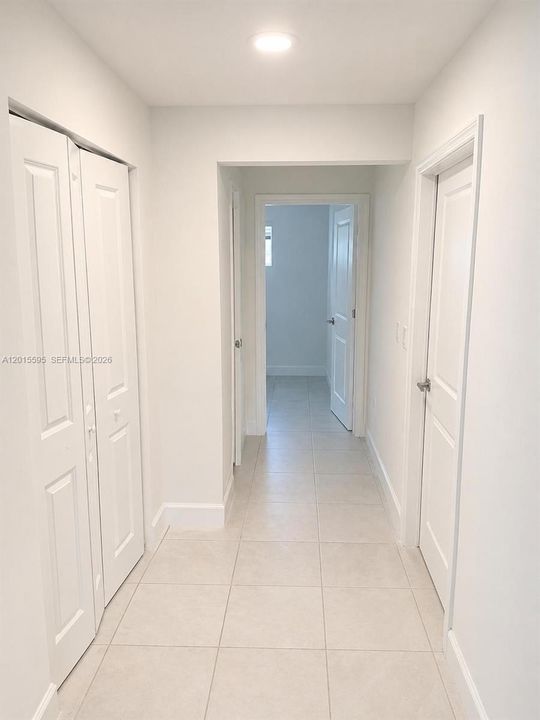Hallway to Laundry room and Half bath