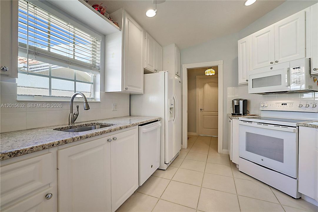 plenty of cupboards and a built-in pantry