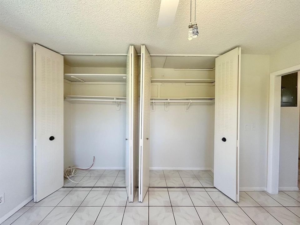BEDROOM FULL WALL CLOSET