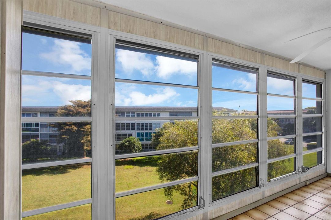 GLASS ENCLOSED PATIO