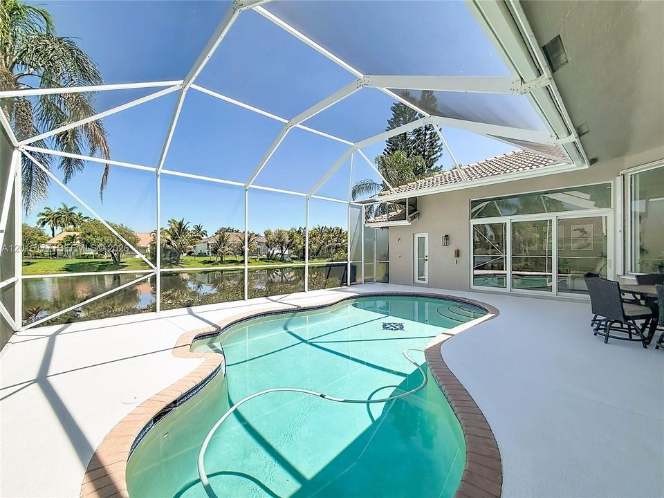 Screened saltwater pool with NEW heat pump and NEW saltwater system