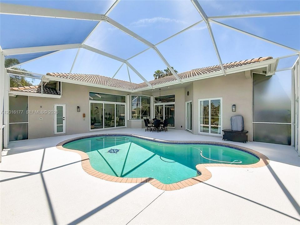 Screened saltwater pool with NEW heat pump and NEW saltwater system