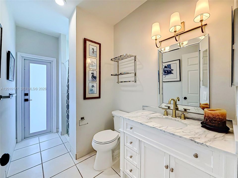 Bathroom for bedroom #2 and pool