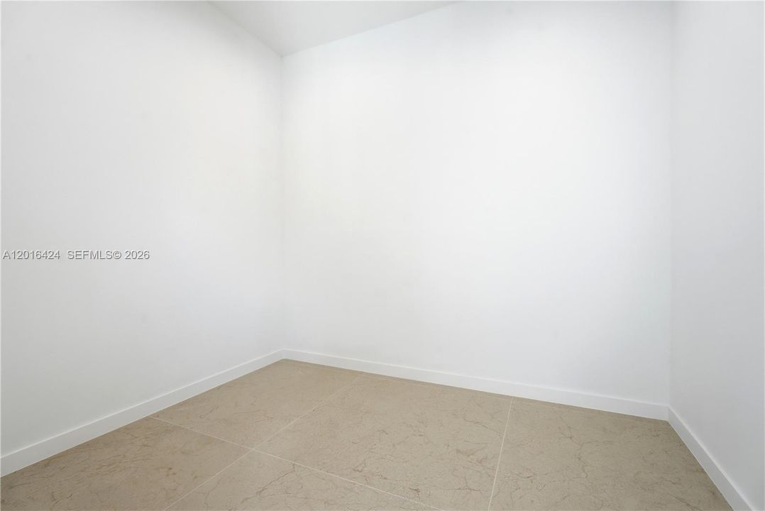 One of two Primary Walk-in Closets