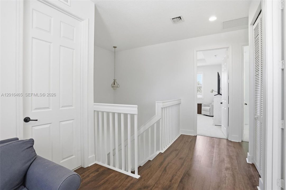 Upstairs landing, with full laundry room w/sink