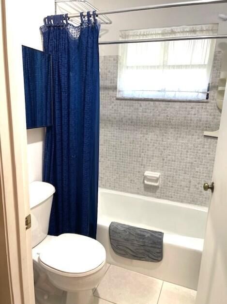 Primary bathroom with combo tub and show
