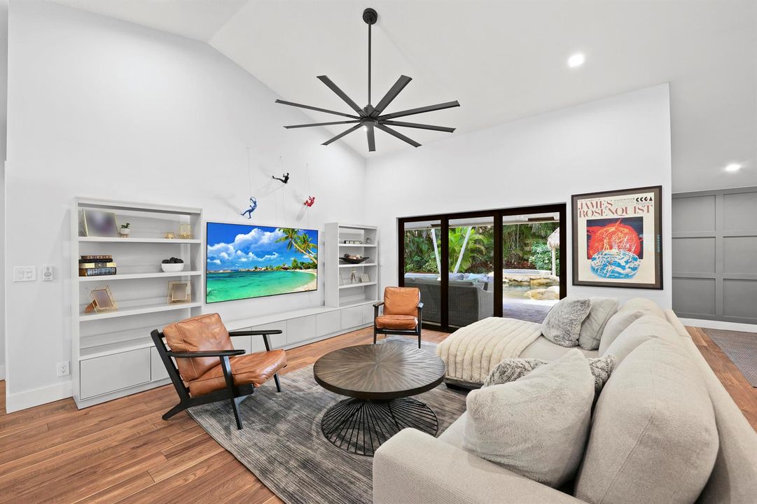 Expansive Living Room Overlooks the Pool