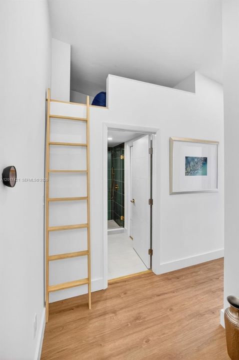 Another view of the ladder to go up to hideaway / storage area