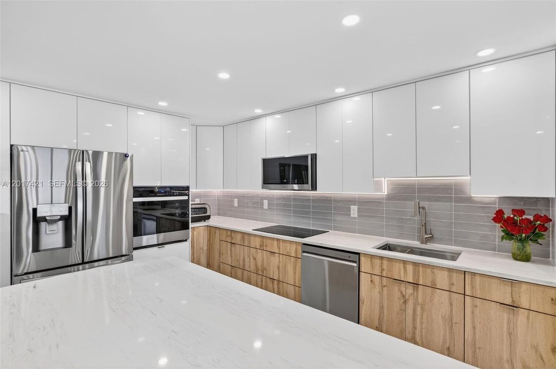 Gorgeous new kitchen cabinets and appliances for great meal prep and entertaining