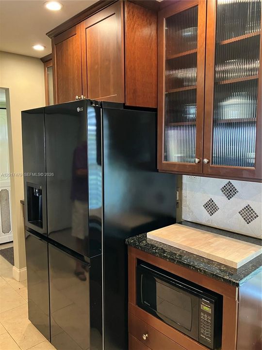 SS Appliances , Granite countertops.