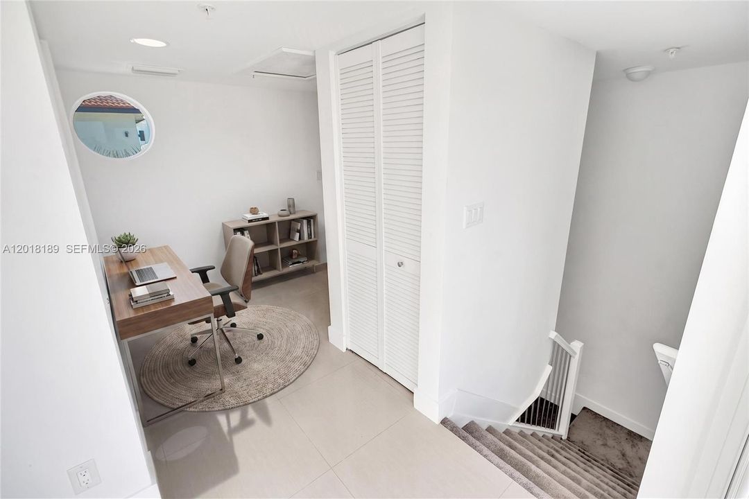4th floor - access to terrace... space for small home office/entertainment/bar