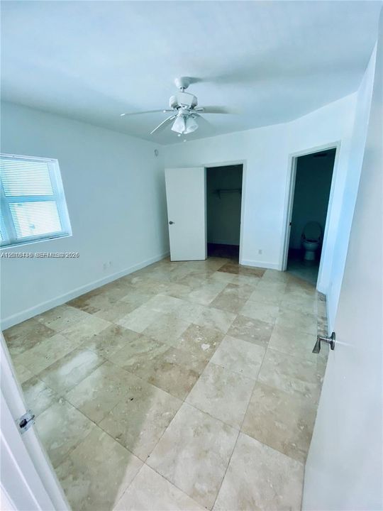 Second bedroom with large walk in closet and en suite bathroom