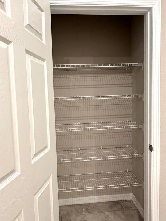 LINEN CLOSET - MASTER BATHROOM