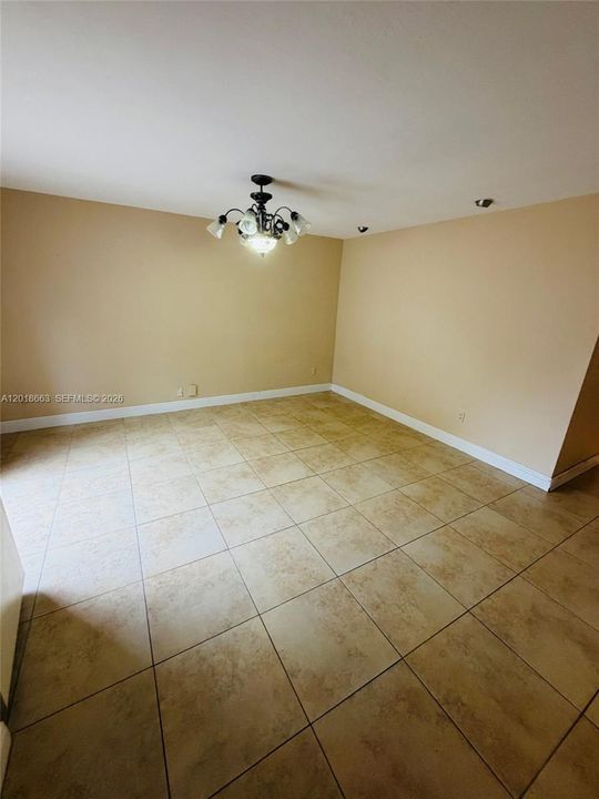 Front of townhouse - versatile room- Living Room or Dining Room or Family room!