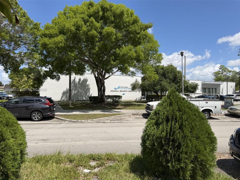 Across from the Kendall Library & Park