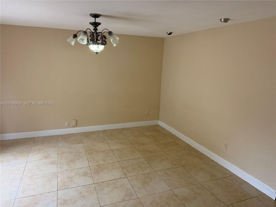 Front of townhouse - versatile room- Living Room or Dining Room or Family room!