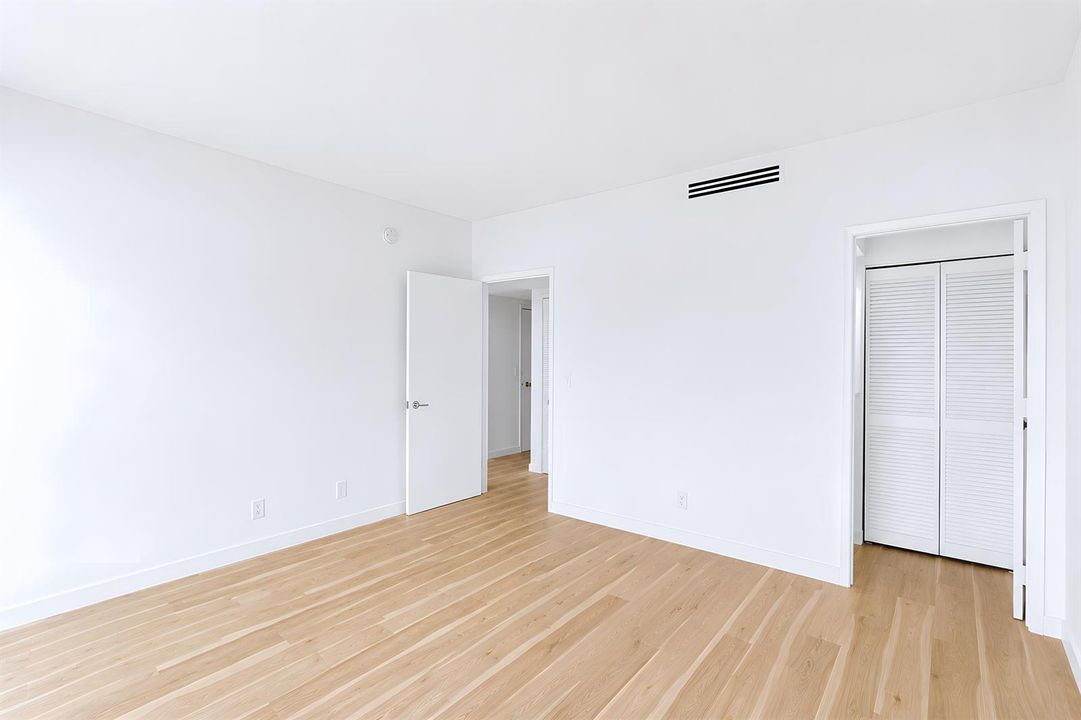 Guest Bedroom w/ Walk-In Closet