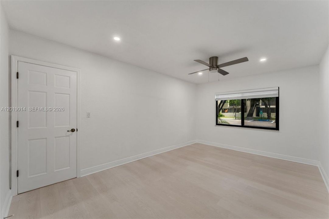 En-suite primary with walk-in closet