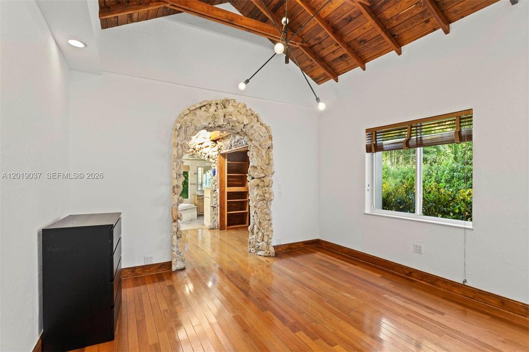 Main room with unique Coral Rock arch.