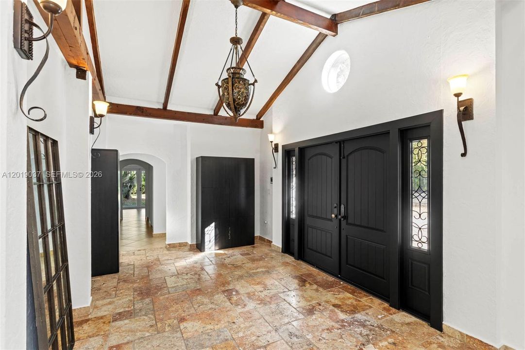 Cathedral ceilings in diferent areas of the house, classy and beautiful.