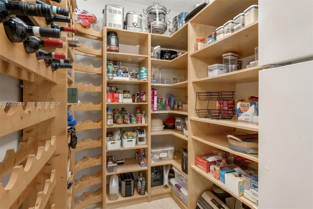 Hidden Pantry with second Fridge & Freezer.