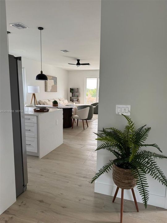 It is being sold unfurnished; the furnishings are shown for visualization purposes only.