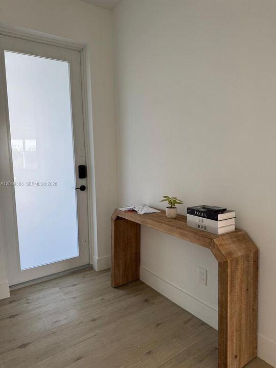 It is being sold unfurnished; the furnishings are shown for visualization purposes only.