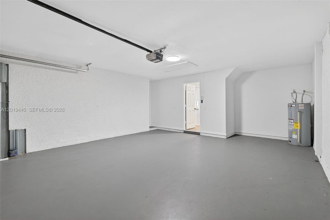 Clean Garage w/Motorized Garage Door Opener