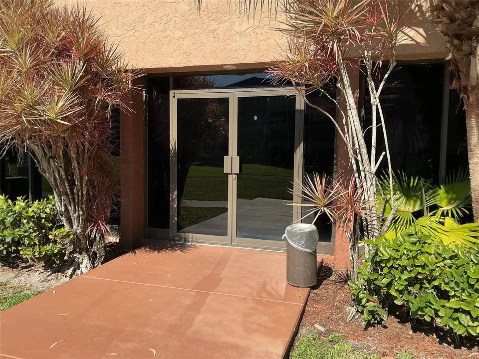 Entrance to area pool adjacent to unit