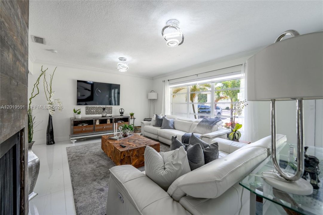 Contemporary indoor living area designed for comfort, entertaining, and seamless indoor-outdoor living.
