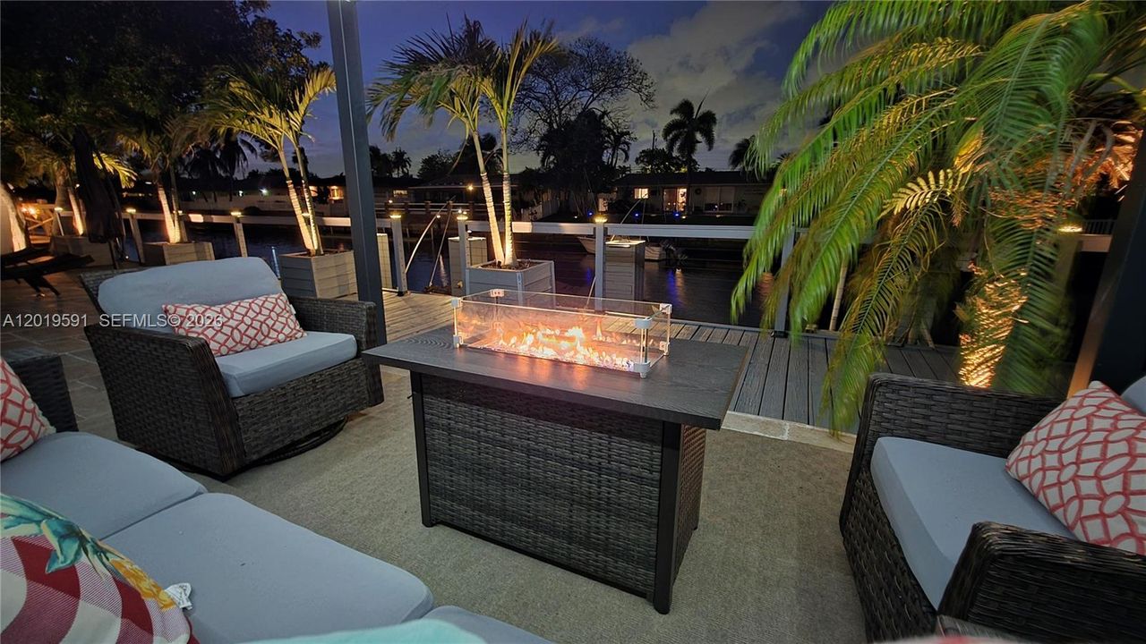 Luxury fire pit lounge area designed for evening gatherings, relaxation, and upscale outdoor entertainment.
