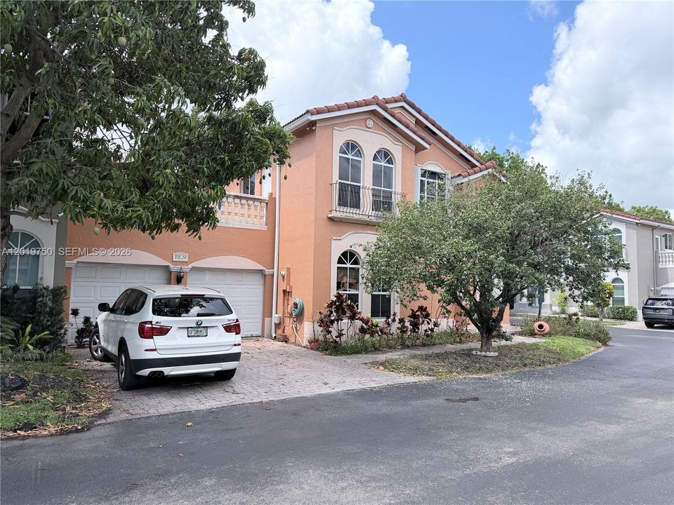 CORNER UNIT, 2 CAR GARAGE.