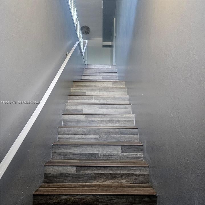 2nd floor walk up entrance...wood flooring throughout