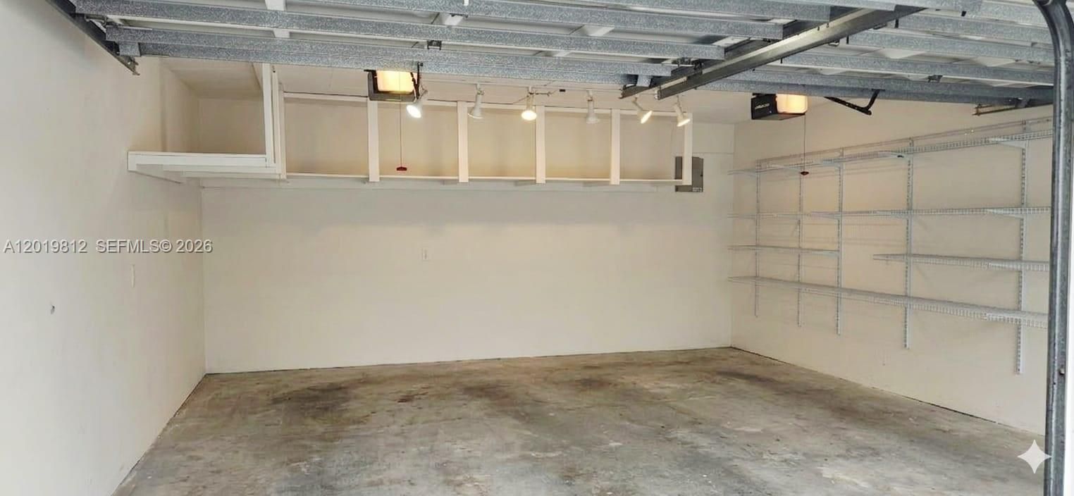 Enclosed two car garage plus storage space