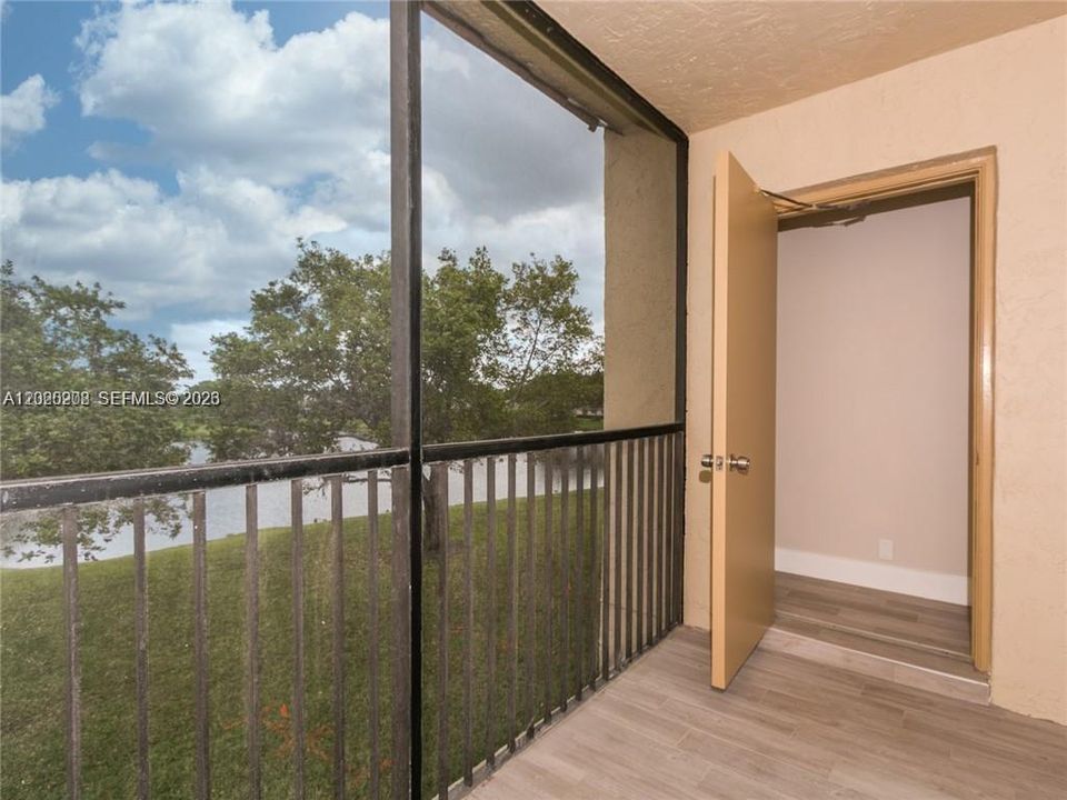 BALCONY WITH LARGE DEPOSIT. VIEW TO LAKE