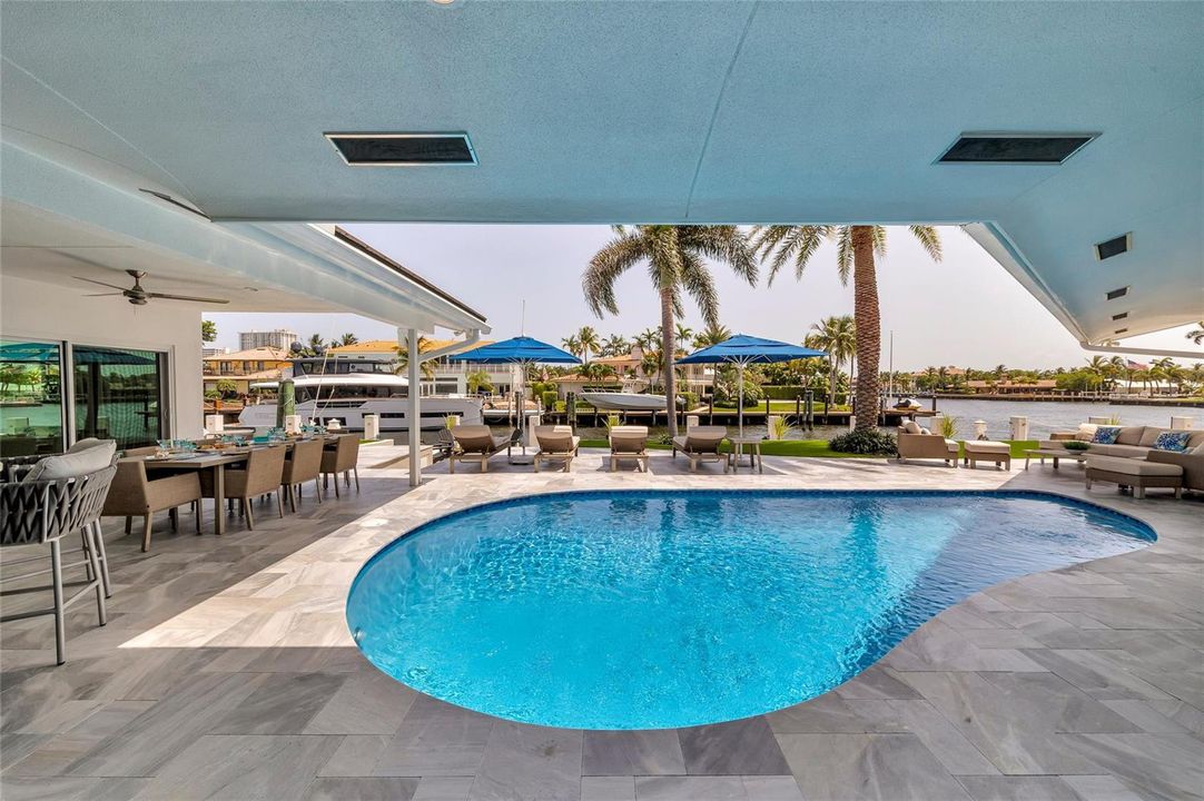 Outdoor patio, pool, dining and lounge